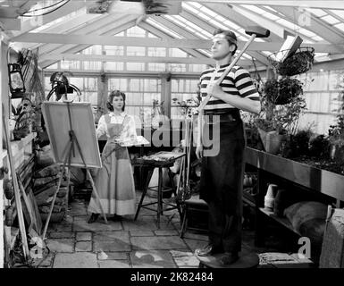 Shirley Temple & John Agar Film: Abenteuer in Baltimore; Bachelor Bait (USA 1949) Regie: Richard Wallace 19. April 1949 **WARNUNG** Dieses Foto ist nur für redaktionelle Zwecke bestimmt und unterliegt dem Copyright von RKO und/oder des Fotografen, der von der Film- oder Produktionsfirma beauftragt wurde, und kann nur von Publikationen im Zusammenhang mit der Bewerbung des oben genannten Films reproduziert werden. Eine obligatorische Gutschrift an RKO ist erforderlich. Der Fotograf sollte auch bei Bekanntwerden des Fotos gutgeschrieben werden. Ohne schriftliche Genehmigung der Film Company kann keine kommerzielle Nutzung gewährt werden. Stockfoto