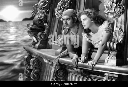 Tyrone Power & Maureen O'Hara Film The Black Swan (USA 1942) Charaktere: Jamie Waring & Regisseur: Henry King 04. Dezember 1942 **WARNUNG** dieses Foto ist nur für redaktionelle Zwecke bestimmt und unterliegt dem Copyright von 20TH CENTURY FOX und/oder dem Fotografen, der von der Film or Production Company zugewiesen wurde. Es kann nur durch Veröffentlichungen in Verbindung mit der Werbung für den oben genannten Film reproduziert werden. Eine obligatorische Gutschrift für 20TH CENTURY FOX ist erforderlich. Der Fotograf sollte ebenfalls angerechnet werden, wenn er bekannt ist. Ohne schriftliche Genehmigung der Film Company kann keine kommerzielle Nutzung gewährt werden. Stockfoto