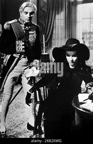 Laurence Olivier, Vivien Leigh Film: Lady Hamilton; That Hamilton Woman (1941) Charaktere: Lord Horatio Nelson,Emma Lady Hamilton Regie: Alexander Korda 03. April 1941 **WARNUNG** Dieses Foto ist nur für redaktionelle Verwendung bestimmt und unterliegt dem Copyright von UNITED ARTISTS und/oder dem Fotografen, der von der Film- oder Produktionsfirma beauftragt wurde und kann nur durch Publikationen im Zusammenhang mit der Bewerbung des oben genannten Films reproduziert werden. Eine obligatorische Gutschrift für UNITED ARTISTS ist erforderlich. Der Fotograf sollte auch bei Bekanntwerden des Fotos gutgeschrieben werden. Eine kommerzielle Nutzung kann ohne schriftliche Genehmigung des nicht gewährt werden Stockfoto