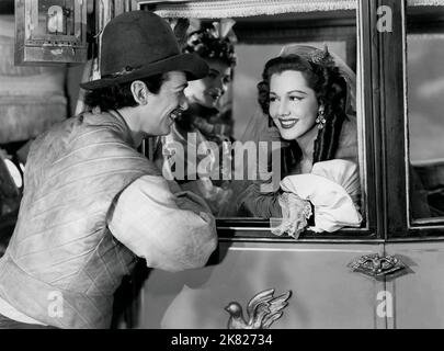 D Fairbanks Jnr & Rita Corday Film: The Exile (USA 1947) Charaktere: & Katie (als Paule Croset) Regie: Max Ophüls 17. Oktober 1947 **WARNUNG** Dieses Foto ist nur für redaktionelle Verwendung bestimmt und unterliegt dem Copyright von UNIVERSAL-BILDERN und/oder dem Fotografen, der von der Film- oder Produktionsfirma beauftragt wurde und darf nur durch Publikationen im Zusammenhang mit der Bewerbung des oben genannten Films reproduziert werden. Eine obligatorische Gutschrift für UNIVERSELLE BILDER ist erforderlich. Der Fotograf sollte auch bei Bekanntwerden des Fotos gutgeschrieben werden. Ohne schriftliche Genehmigung der Film Company kann keine kommerzielle Nutzung gewährt werden. Stockfoto