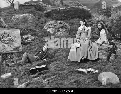 Arthur Kennedy, Olivia De Havilland & Nancy Coleman Film: Devotion (USA 1946) Charaktere: Branwell Bronte, Charlotte Bronte, Anne Bronte Regie: Curtis Bernhardt 05. April 1946 **WARNUNG** Dieses Foto ist nur für redaktionelle Zwecke bestimmt und unterliegt dem Copyright von WARNER BROS. Und/oder des Fotografen, der von der Film- oder Produktionsfirma beauftragt wurde und nur durch Publikationen im Zusammenhang mit der Bewerbung des oben genannten Films reproduziert werden kann. Eine obligatorische Gutschrift an WARNER BROS. Ist erforderlich. Der Fotograf sollte auch bei Bekanntwerden des Fotos gutgeschrieben werden. Eine kommerzielle Nutzung kann ohne schriftliche Genehmigung von nicht gewährt werden Stockfoto