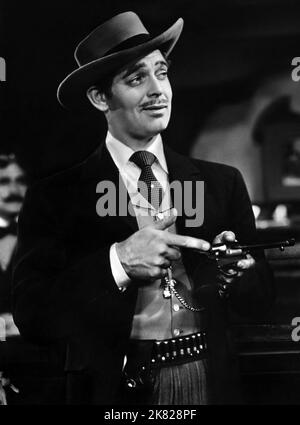 Clark Gable Film: Honky Tonk (USA 1941) Charaktere: „Candy“ Johnson Regie: Jack Conway 01 October 1941 **WARNUNG** Dieses Foto ist nur für redaktionelle Zwecke bestimmt und unterliegt dem Copyright von MGM und/oder dem von der Film- oder Produktionsfirma beauftragten Fotografen und kann nur von Publikationen im Zusammenhang mit der Bewerbung des oben genannten Films reproduziert werden. Eine obligatorische Gutschrift an MGM ist erforderlich. Der Fotograf sollte auch bei Bekanntwerden des Fotos gutgeschrieben werden. Ohne schriftliche Genehmigung der Film Company kann keine kommerzielle Nutzung gewährt werden. Stockfoto