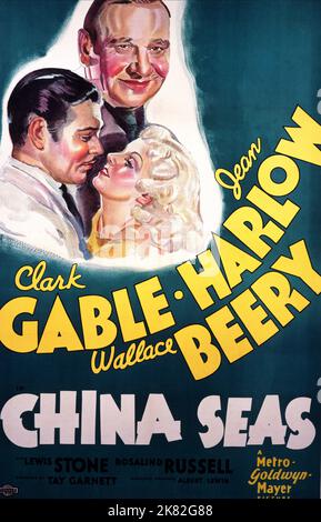 Clark Gable, Wallace Beery & Jean Harlow Poster Film: China Seas (USA 1935) Charaktere: Jamesy MacArdle, Alan Gaskell, China Doll Regie: Tay Garnet 09. August 1935 **WARNUNG** Dieses Foto ist nur für redaktionelle Zwecke bestimmt und unterliegt dem Copyright von MGM und/oder dem Fotografen, der von der Film- oder Produktionsfirma beauftragt wurde, und kann nur von Publikationen im Zusammenhang mit der Bewerbung des oben genannten Films reproduziert werden. Eine obligatorische Gutschrift an MGM ist erforderlich. Der Fotograf sollte auch bei Bekanntwerden des Fotos gutgeschrieben werden. Ohne schriftliche Genehmigung der Film Company kann keine kommerzielle Nutzung gewährt werden. Stockfoto