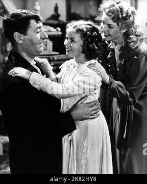 Arthur Treacher, Shirley Temple & Anita Louise Film: Die Kleine Prinzessin (1939) Charaktere: Bertie Minchin, Sara Crewe, Rose Regie: Walter lang 10 March 1939 **WARNUNG** Dieses Foto ist nur für den redaktionellen Gebrauch bestimmt und unterliegt dem Copyright von 20. CENTURY FOX und/oder des Fotografen, der von der Film- oder Produktionsfirma beauftragt wurde und darf nur durch Publikationen im Zusammenhang mit der Bewerbung des oben genannten Films reproduziert werden. Eine obligatorische Gutschrift an 20. CENTURY FOX ist erforderlich. Der Fotograf sollte auch bei Bekanntwerden des Fotos gutgeschrieben werden. Ohne schriftliche Genehmigung des Films kann keine kommerzielle Nutzung gewährt werden Stockfoto