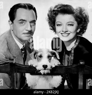 William Powell & Myrna Loy Film: After the Thin man (USA 1936) Charaktere: Nick Charles & Nora Regie: W.S. Van Dyke 25 December 1936 **WARNUNG** Dieses Foto ist nur für redaktionelle Zwecke bestimmt und unterliegt dem Copyright von MGM und/oder dem Fotografen, der von der Film- oder Produktionsfirma beauftragt wurde, und kann nur durch Publikationen im Zusammenhang mit der Bewerbung des oben genannten Films reproduziert werden. Eine obligatorische Gutschrift an MGM ist erforderlich. Der Fotograf sollte auch bei Bekanntwerden des Fotos gutgeschrieben werden. Ohne schriftliche Genehmigung der Film Company kann keine kommerzielle Nutzung gewährt werden. Stockfoto