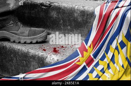 Das Bein des Militärs steht auf der Stufe neben der Flagge von British Columbia, dem Konzept des militärischen Konflikts Stockfoto
