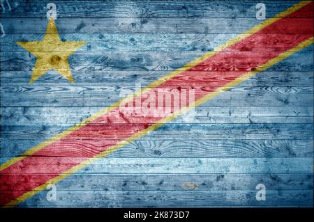 Ein bandtypischen Hintergrundbild der Flagge des Kongo Kinshasa auf Holzbrettern einer Wand oder Boden gemalt. Stockfoto