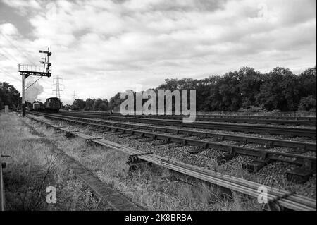 '92212' läuft als '92178' bei swithland Sidings mit einer Mischware. Stockfoto