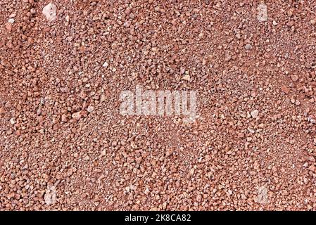 Abstrakter Hintergrund - Rote vulkanische Steine Bodenstruktur im Timanfaya Nationalpark, Lanzarote, Kanarische Inseln, Spanien - 20.. September 2022 Stockfoto