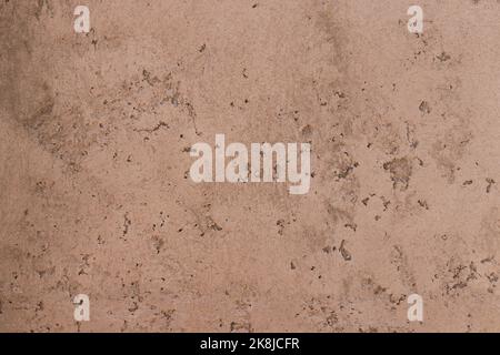 Braunes Beton- oder Zementmaterial in abstrakter Wandhintergrundstruktur. Stockfoto