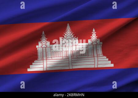 Cambodia Flagge mit großen Falten winken aus nächster Nähe unter dem Studiolicht im Innenbereich. Die offiziellen Symbole und Farben in Stoff Banner Stockfoto