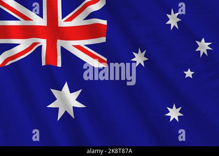 Australien Flagge mit großen Falten winken aus nächster Nähe unter dem Studiolicht im Innenbereich. Die offiziellen Symbole und Farben in Stoff Banner Stockfoto