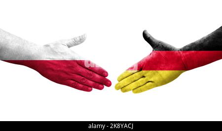 Handschlag zwischen Deutschland und Polen Flaggen auf Händen gemalt, isolierte transparente Bild. Stockfoto