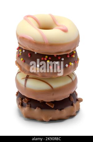 Chocolate Candy Donuts Stack auf Weiß ausgeschnitten. Stockfoto