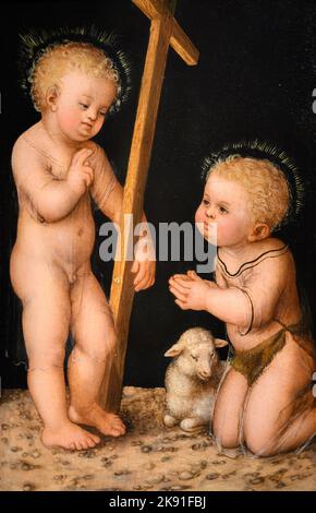 Der heilige Johannes der Täufer, der das Christuskind anbeten (um 1512 – 1520) von Lucas Cranach dem Älteren (1472 – 1553). Öl auf der Platte. Stockfoto