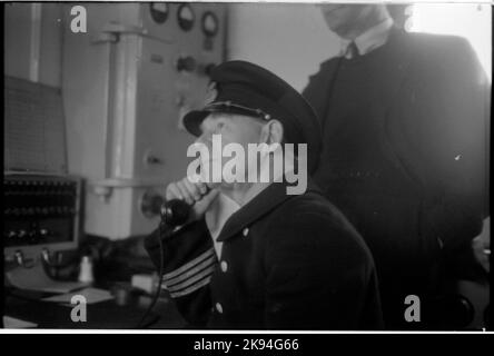 Das Personal an Bord ist schnell. Stockfoto