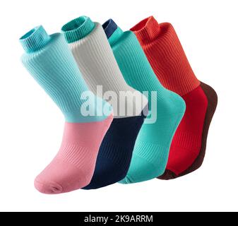 Mehrfarbige Socken in verschiedenen Designs, knielange Stricksocken. Hochauflösendes Foto auf weißem Hintergrund isoliert. Stockfoto