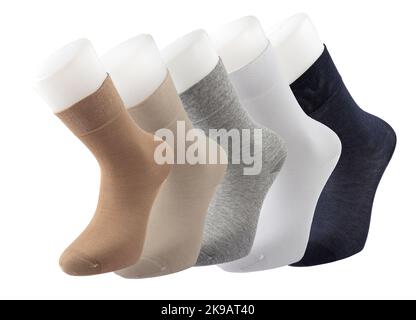 Mehrfarbige Socken in verschiedenen Designs, knielange Stricksocken. Hochauflösendes Foto auf weißem Hintergrund isoliert. Stockfoto