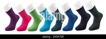 Mehrfarbige Socken in verschiedenen Designs, knielange Stricksocken. Hochauflösendes Foto auf weißem Hintergrund isoliert. Stockfoto