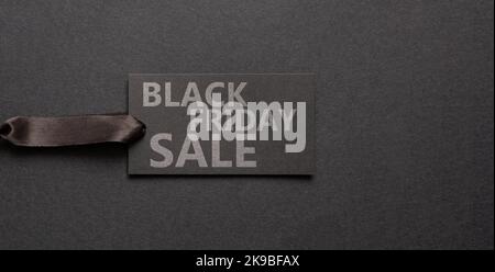 Black Friday Sale Preisschild. Einkaufsetikett mit Satinband und Text. Speichern Sie die Werbevorlage Stockfoto