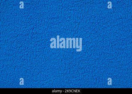 Blaues Fleecejacke Futter als Textur oder Hintergrund, Draufsicht. Stockfoto