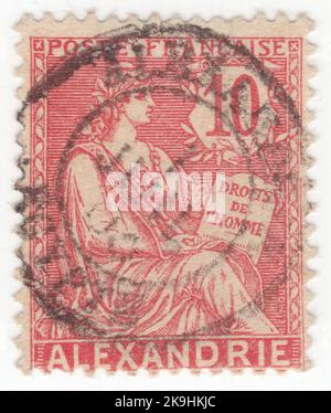 ALEXANDRIA - 1902: Eine rosérote Briefmarke mit 10 Rappen, die Allegorie „die Rechte des Menschen“ zeigt. Standardausgabe 'Mouchon', entworfen von Louis-Eugène Mouchon. Französischer Maler, Grafiker, Medaillengewinnerin, Kupferstecher und Bildhauer Stockfoto