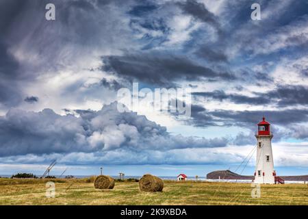 Der Anse a La Cabane, oder Millerand Leuchtturm von Havre Aubert, in Iles de la Madeleine, oder der Magdalen Islands, Kanada. Dies ist die höchste und Ältesten Stockfoto