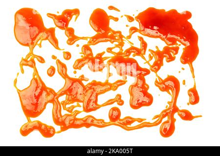 Orangensauce spritzt isoliert auf weißem Hintergrund. Draufsicht. Stockfoto