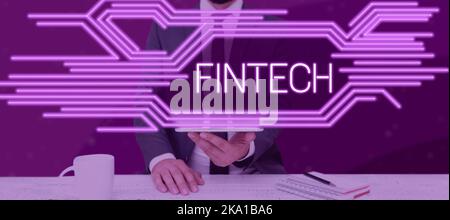 Text mit Inspiration Fintech. Wort zur Integration von Technologie in Angebote durch Finanzdienstleister mit Einem Tablet Stockfoto