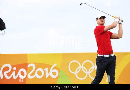 RIO DE JANEIRO, BRASILIEN 20160811. Olympische Sommerspiele in Rio 2016. Der norwegische Golfer Espen Kofstad in Aktion in 1. Runde des Golfturniers bei den Olympischen Spielen in Rio Donnerstag. Foto: Erik Johansen / NTB scanpix Stockfoto