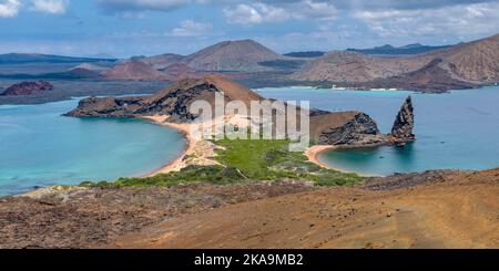 Eine der besten Orte, die Sie besuchen können, wenn Sie zu den Galapagos Inseln reisen, ist Bartolomé Insel. Die Spitze ist ihr Wahrzeichen und das Schnorcheln in Th Stockfoto