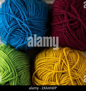 multi-colored threads for knitting, Selection of colorful woolen yarn. Yarn for knitting winter clothes with your own hands. High quality photo Stockfoto