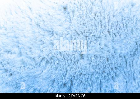 Blaues Schafpelz. Natürliche Schaffell Teppich Hintergrund. Wollstruktur. Hochwertige Fotos Stockfoto