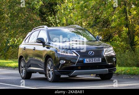 2013 schwarzes Hybrid-Elektroauto Lexus RX 450h LUXUS-CVT Stockfoto