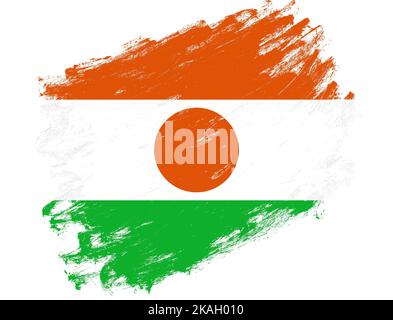 Niger Flagge auf einem grunge Pinsel Strich weißen Hintergrund gemalt Stockfoto