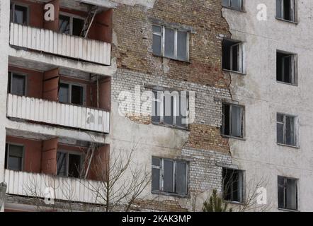 Eine allgemeine Ansicht der verlassenen Stadt Pripyat, in der Nähe des Kernkraftwerks Tschernobyl in Tschernobyl, Ukraine, 22. Dezember 2016. Der neue Schutzraum über den Resten der Kernreaktoreinheit 4 wird den betroffenen vierten Reaktor sichern. Die Hütte ist über 105 Meter hoch und wiegt 36.000 Tonnen. Die Explosion der Einheit 4 des Kernkraftwerks Tschernobyl in den frühen Morgenstunden des 26. April 1986 gilt noch immer als der größte Unfall in der Geschichte der Atomenergie-Erzeugung (Foto: Maxym Marusenko/NurPhoto) *** Bitte benutzen Sie den Credit Field *** Stockfoto