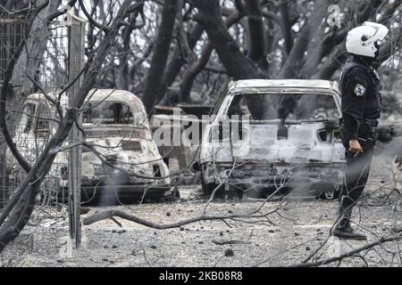 Bilder von zerstörten und verbrannten Autos beim Brand in Mati, Attica am 23. Juli 2018. Die Autos aus dem weiteren Gebiet von Mati und Neos Voutsas im östlichen Attika bei Athen nach dem Brand. Das Aluminium der Räder schmilzt und verflüssigt, die Schmelztemperatur von Aluminium beträgt 660,3 Grad Das Feuer, das am 23. Juli 2018 stattfand, war eine der Würden des Jahrhunderts. Die Zahl der Todesopfer wurde auf über 90 erhöht. Viele Menschen werden immer noch vermisst und die Forschung läuft noch. Das Gebiet ist immer noch ohne Strom. Die erste Zählung war, dass 2500 Häuser zerstört wurden. 28. Juli 2018 - Mati, Stockfoto