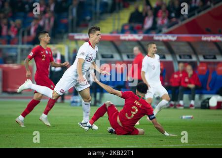 Krzysztof Piatek, Pepe (Kepler Laveran de Lima Ferreira) während der UEFA Nations League Ein Fußballspiel zwischen Polen und Portugal im Schlesischen Stadion in Chorzow, Polen am 11. Oktober 2018 (Foto: Mateusz Wlodarczyk/NurPhoto) Stockfoto