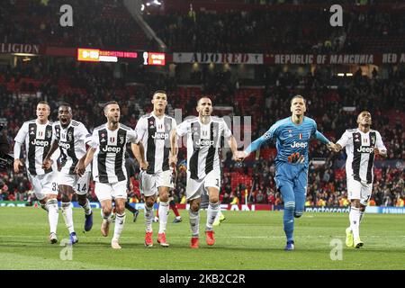 Juventus-Team feiert den Sieg nach dem UEFA Champions League Group Stage-Fußballspiel n.3 Manchester United gegen Juventus am 23. Oktober 2018 im Old Trafford in Manchester, Großbritannien. (Foto von Matteo Bottanelli/NurPhoto) Stockfoto