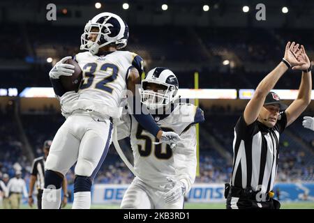 Der Eckpfeiler von Los Angeles Rams, Troy Hill (32), feiert mit dem Außenlinebacker Samson Ebukam (50), nachdem er während der zweiten Hälfte eines NFL-Fußballspiels in Detroit, Michigan, USA, am Sonntag, dem 2. Dezember 2018, einen Pass für den Detroit Lions Wide Receiver Kenny Golladay (19) abgefangen hatte. (Foto von Jorge Lemus/NurPhoto) Stockfoto