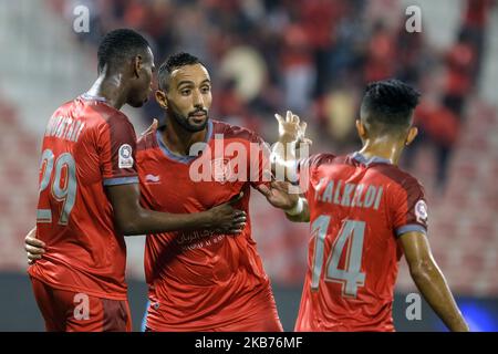 Medhi Benatia feiert Karim Boudiafs Siegtreffer während der Al Shahaniya 0-1 Al Duhail am 28. September 2019 im Grand Hamad Stadium, Doha, Katar. (Foto von Simon Holmes/NurPhoto) Stockfoto