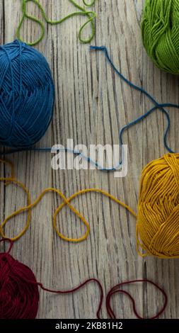 multi-colored threads for knitting, Selection of colorful woolen yarn. Yarn for knitting winter clothes with your own hands. High quality photo Stockfoto