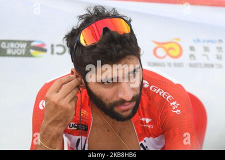 Fernando Gaviria aus Kolumbien und dem VAE Team Emirates, während der Preisverleihung der Eröffnungsphase der Cycling Tour de Guangxi 2019. Am Donnerstag, den 17. Oktober 2019, China. (Foto von Artur Widak/NurPhoto) Stockfoto