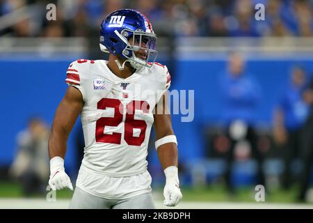 New York Giants läuft zurück Saquon Barkley (26) schaut nach einem Spiel während der ersten Hälfte eines NFL-Fußballspiels gegen die New York Giants in Detroit, Michigan, USA, am Sonntag, den 27. Oktober 2019, auf das Spielfeld. (Foto von Amy Lemus/NurPhoto) Stockfoto