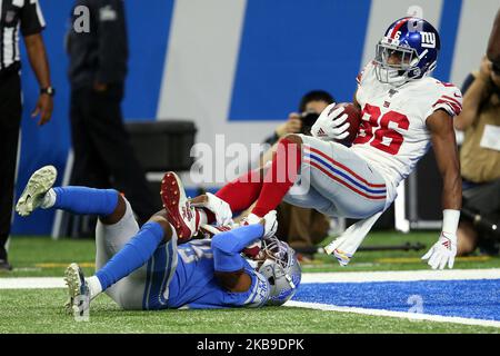 Der New York Giants Wide Receiver Darius Slayton (86) wird am Sonntag, den 27. Oktober 2019, von dem Detroit Lions-Eckpfeiler Rashaan Melvin (29) während der ersten Hälfte eines NFL-Fußballspiels gegen die Detroit Lions in Detroit, Michigan, USA, abgesetzt. (Foto von Amy Lemus/NurPhoto) Stockfoto