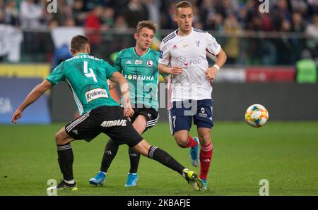 Mateusz Wieteska (Legia),Arvydas Novikovas (Legia),David Kopacz (Gornik) während des Fußballmatches der PKO Ekstraklasa zwischen Legia Warschau und Gornik Zabrze am 9. November 2019 im Stadion der polnischen Armee in Warschau, Polen. (Foto von Foto Olimpik/NurPhoto) Stockfoto