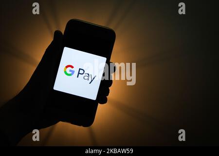 Das Google Pay-Logo wird auf einem Telefonbildschirm in dieser Abbildung, die am 13. November 2019 in Krakau, Polen, aufgenommen wurde, angezeigt. (Fotoillustration von Jakub Porzycki/NurPhoto) Stockfoto