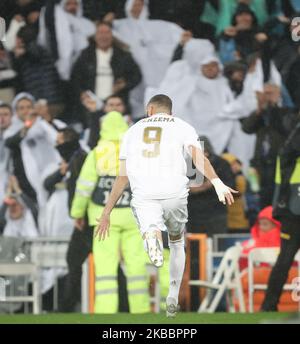 Real Madrids französischer Stürmer Karim Benzema feiert sein Tor während des Fußballspiels der UEFA Champions League-Gruppe A gegen den FC Paris Saint-Germain am 26. November 2019 im Santiago Bernabeu-Stadion in Madrid. (Foto von Raddad Jebarah/NurPhoto) Stockfoto