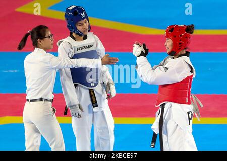 Pauline Lopez von den Philippinen reagiert nach ihrem Sieg gegen Aliza Chhoeung von Kambodscha im Taekwondo-Finalspiel der Frauen -57kg für die Südostasienspiele 30., die am 8. Dezember 2019 in Manila, Philippinen, ausgetragen wurden. Lopez gewann die Goldmedaille. (Foto von George Calvelo/NurPhoto) Stockfoto