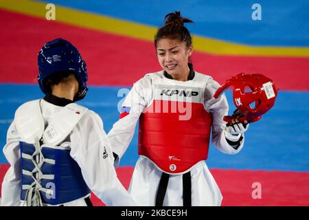 Pauline Lopez von den Philippinen reagiert nach ihrem Sieg gegen Aliza Chhoeung von Kambodscha im Taekwondo-Finalspiel der Frauen -57kg für die Südostasienspiele 30., die am 8. Dezember 2019 in Manila, Philippinen, ausgetragen wurden. Lopez gewann die Goldmedaille. (Foto von George Calvelo/NurPhoto) Stockfoto